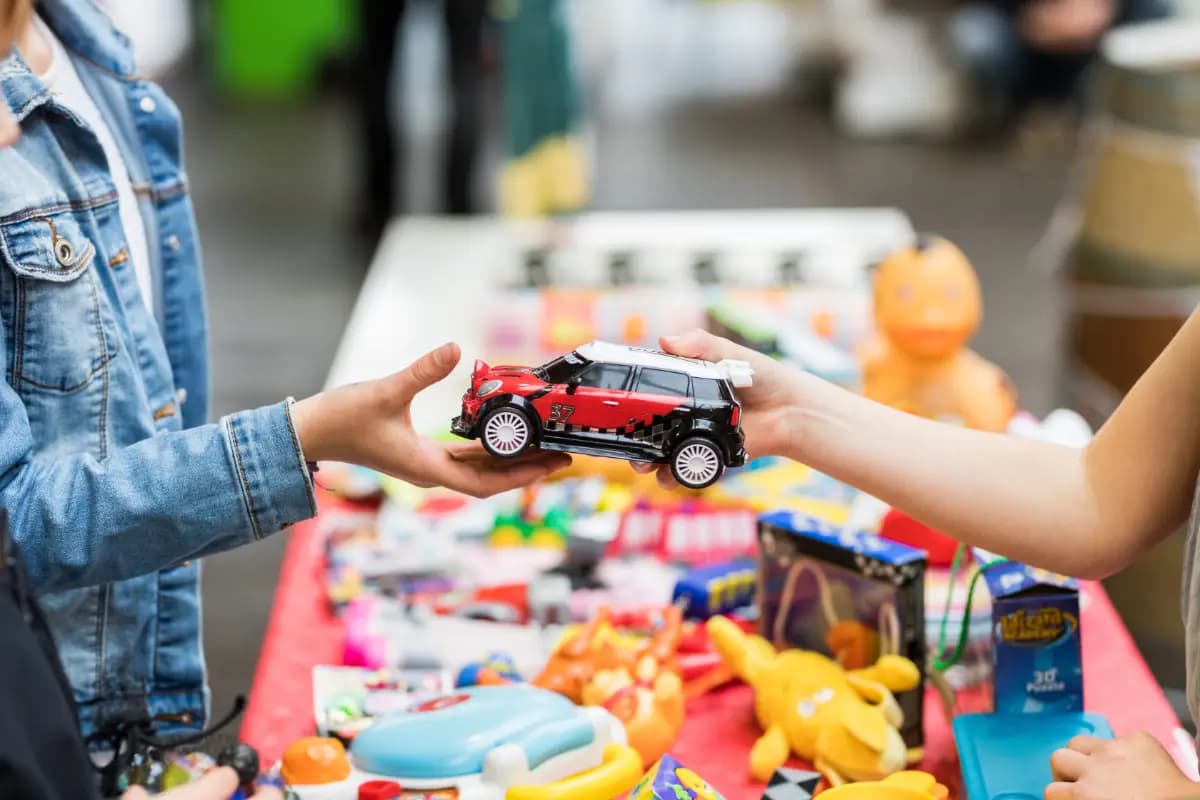 Two kids sharing car